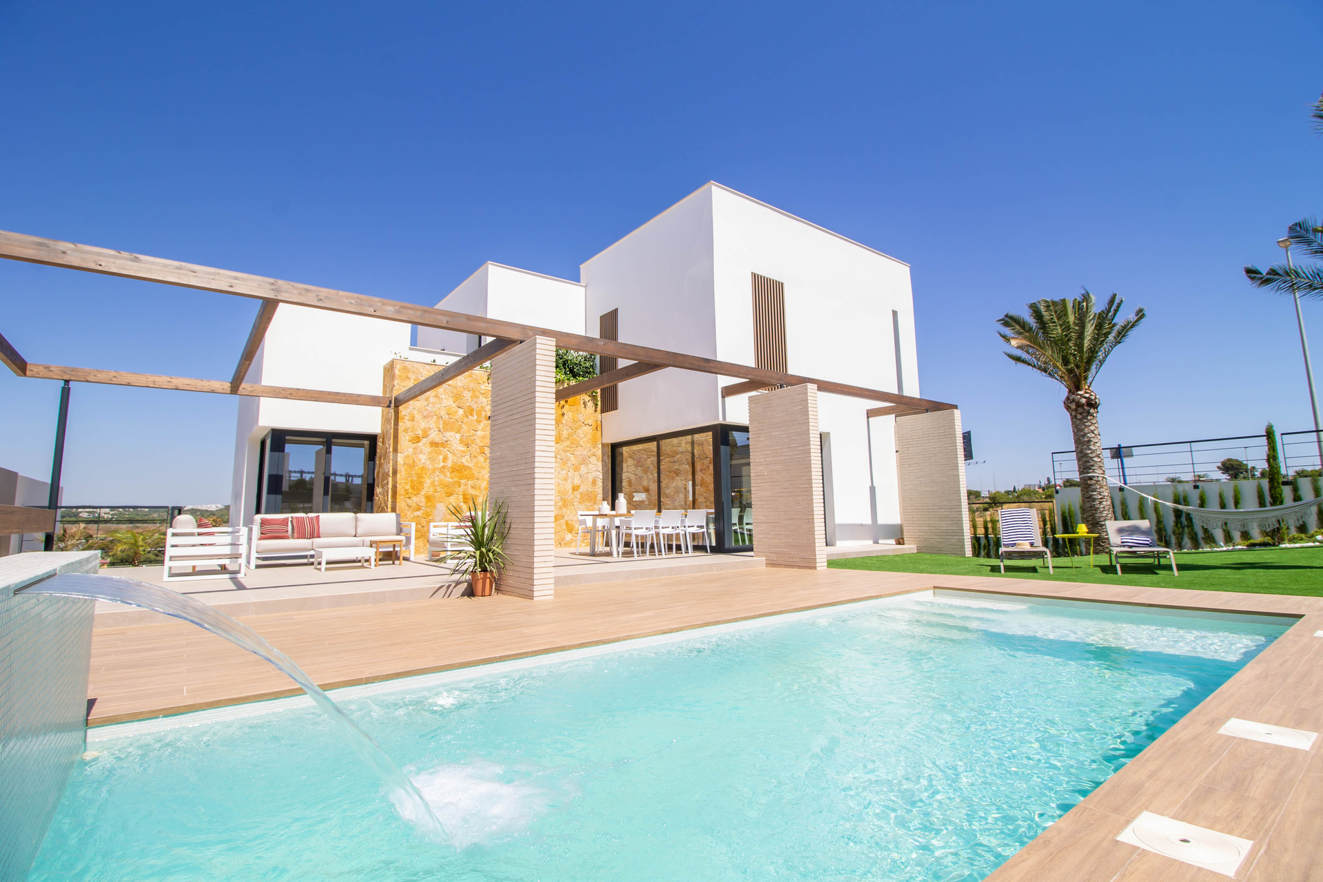 Pool area in villa for sale in Orihuela Costa
