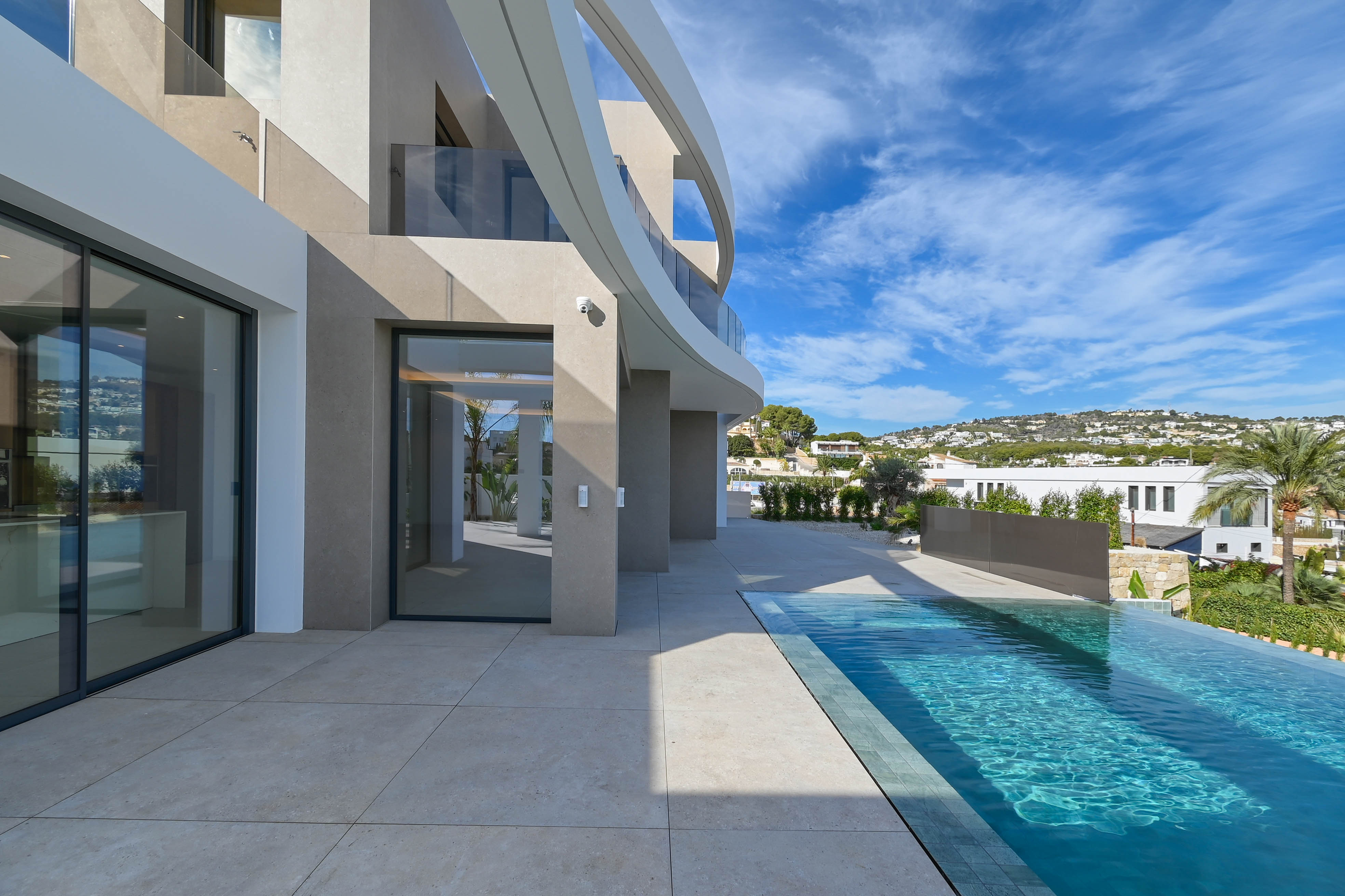 Located in the charming town of Benisa, this exclusive villa offers a privileged setting with sea vi