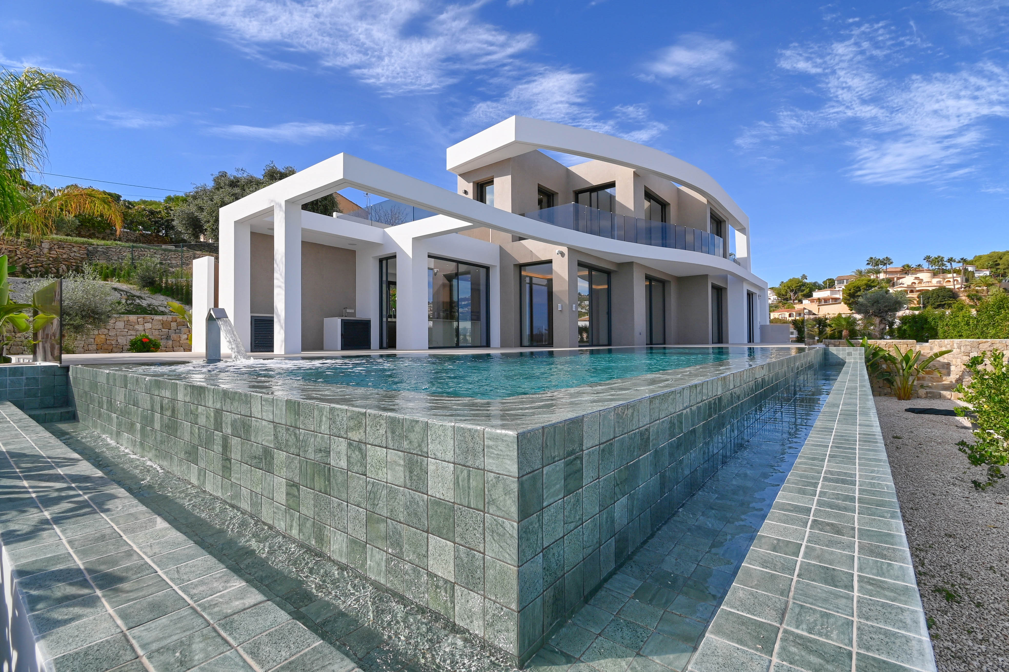 Located in the charming town of Benisa, this exclusive villa offers a privileged setting with sea vi