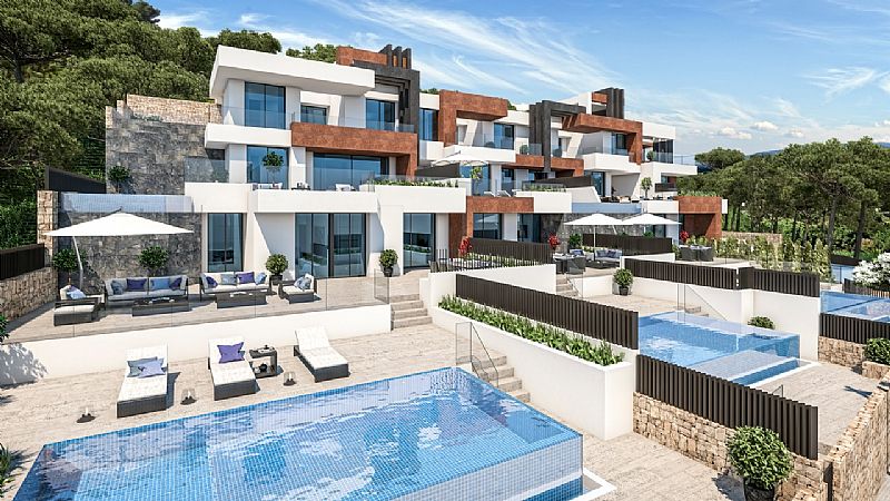 Located in the charming town of La Vila Joiosa, this townhouse offers a unique living experience wit