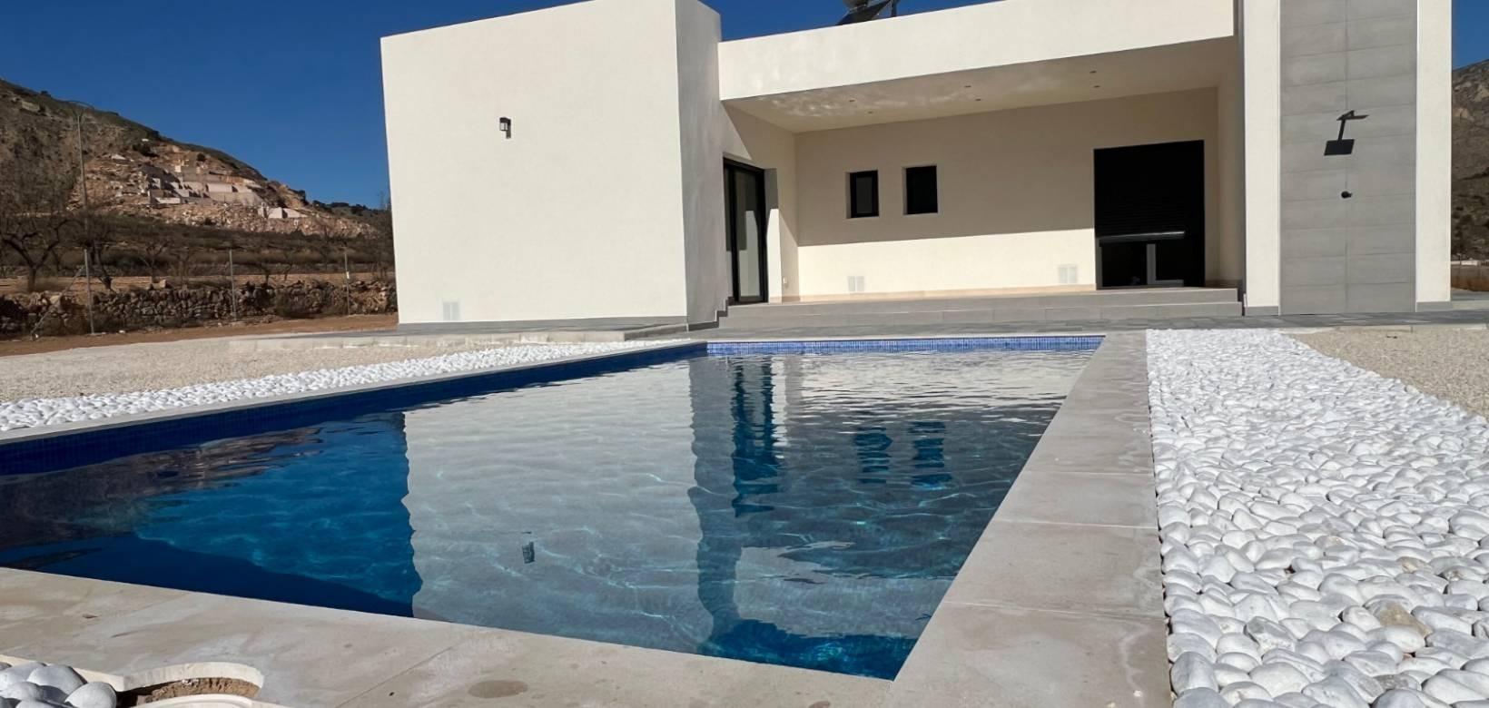 Pool area in villa for sale in La Canalosa
