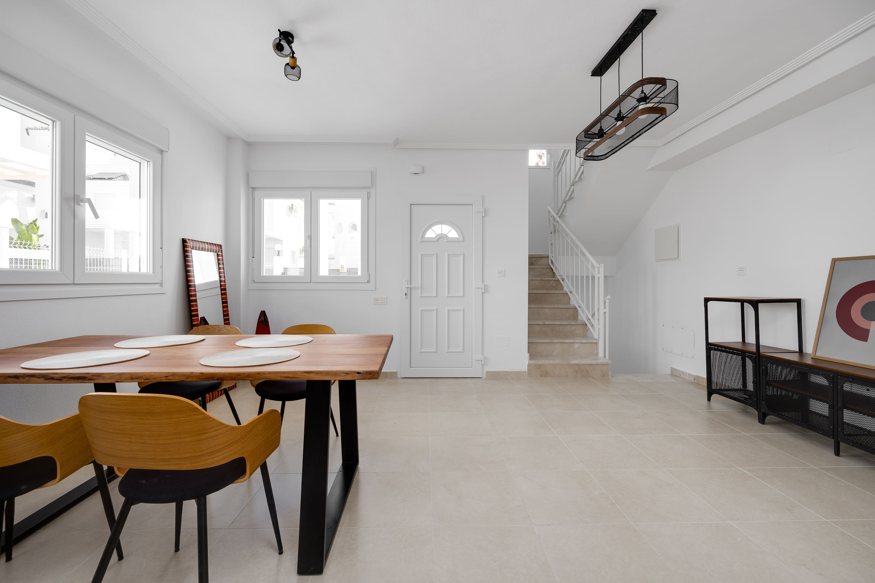 Located in the charming town of San Fulgencio, this exclusive real estate offer consists of three in