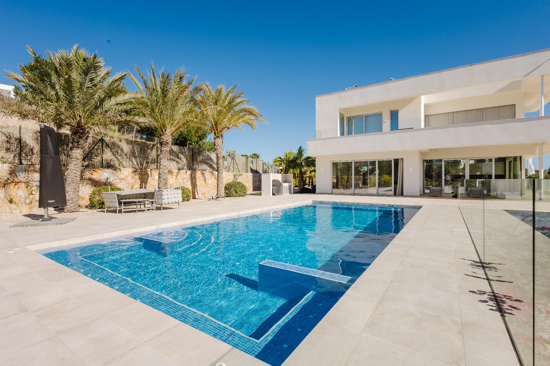 Pool area in villa for sale in Orihuela Costa