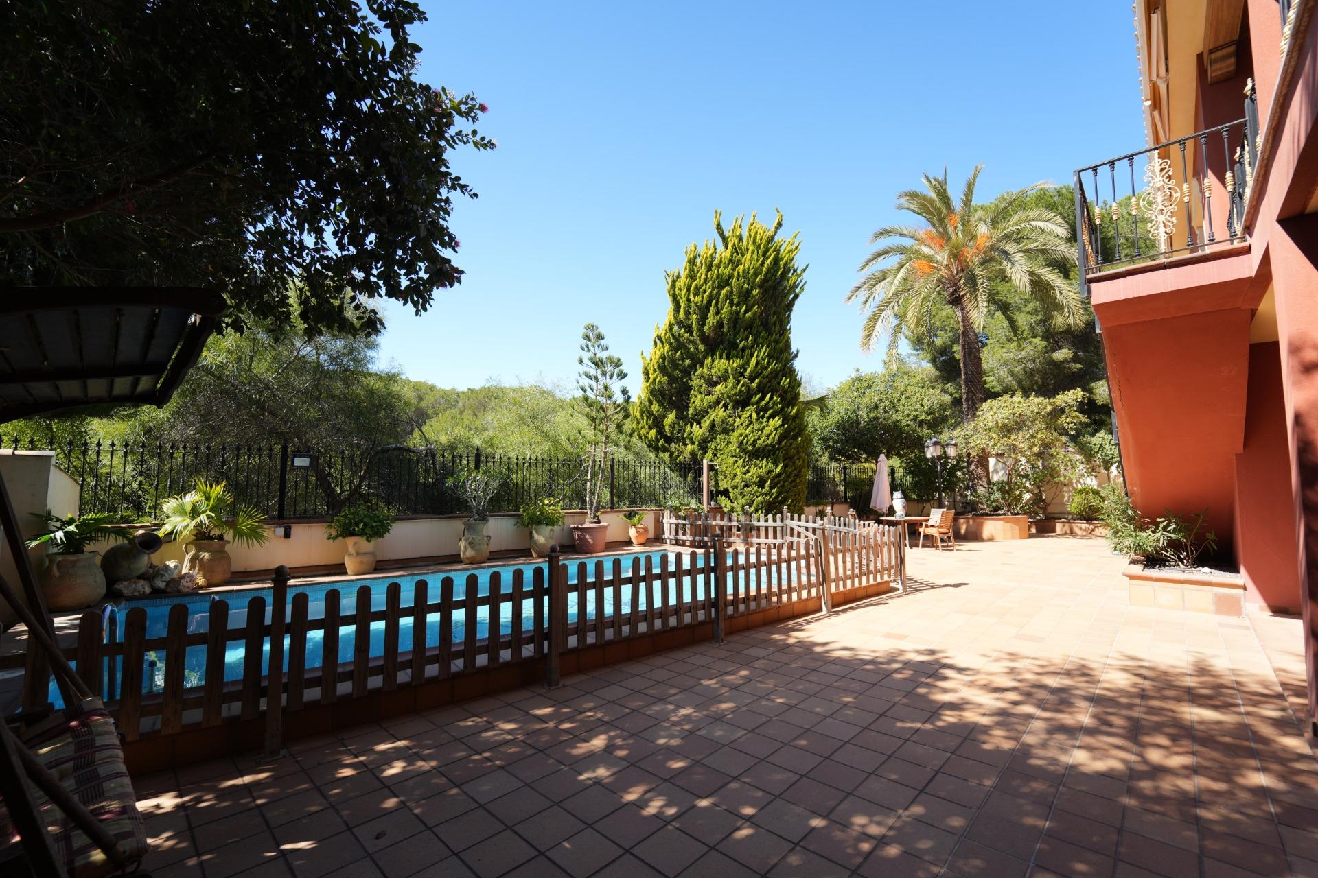 Pool area in villa for sale in Orihuela Costa
