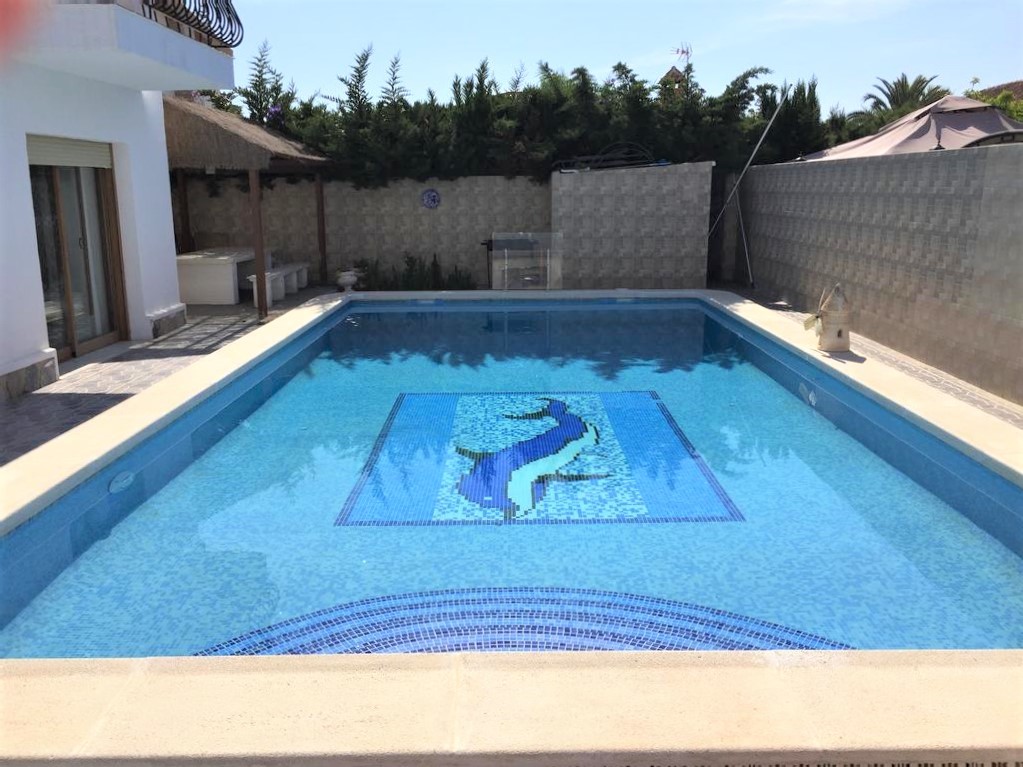 Pool area in villa for sale in Torrevieja