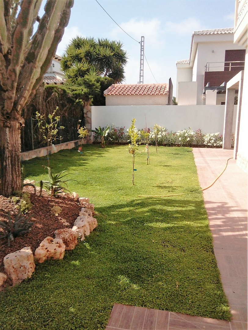 Pool area in villa for sale in Cabo Roig