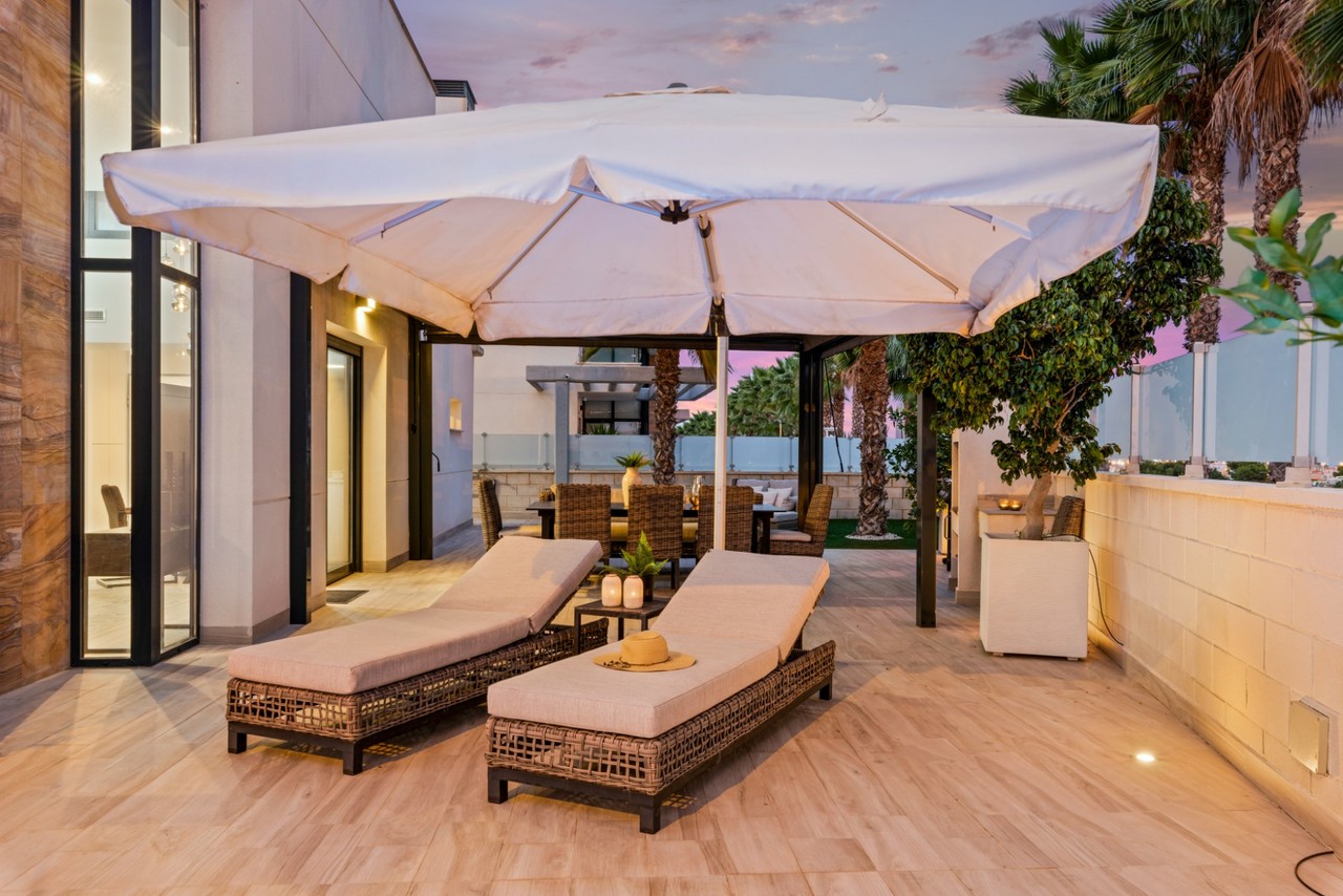 Pool area in villa for sale in Cabo Roig
