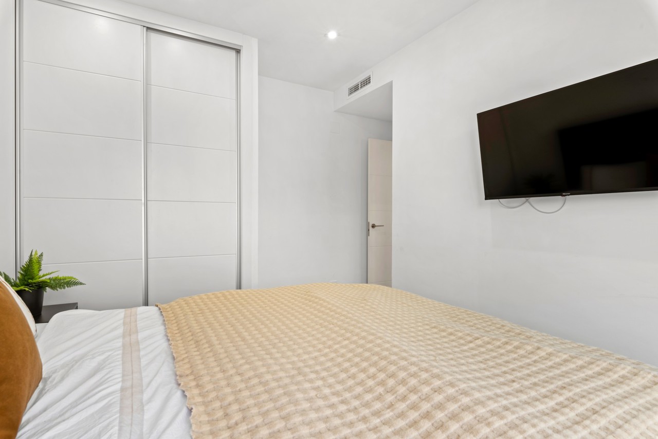 Master bedroom in villa for sale in Cabo Roig