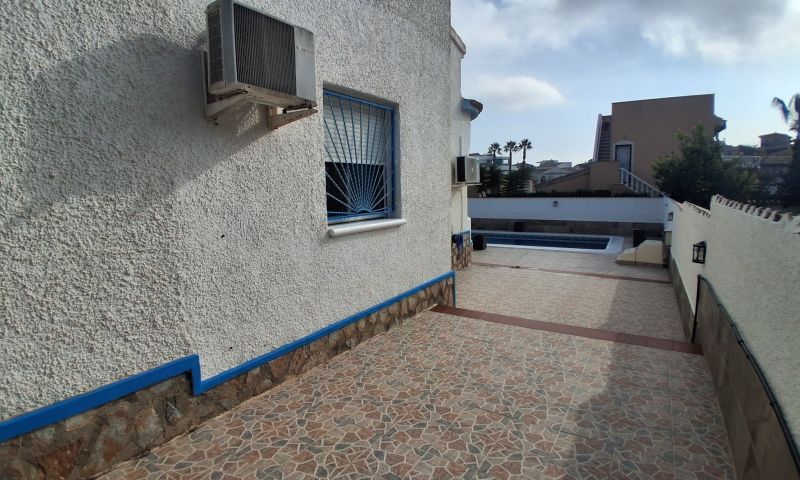Pool area in villa for sale in Rojales