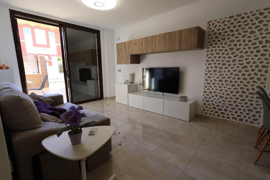 Pool area in terraced for sale in Orihuela Costa