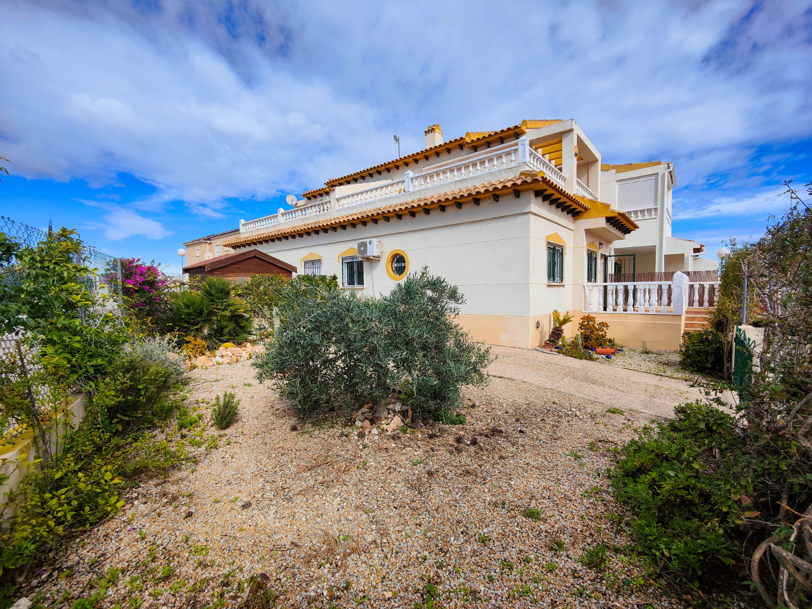Beautiful corner quad house in Punta Prima, Orihuela Costa, located in a quiet area next to a green