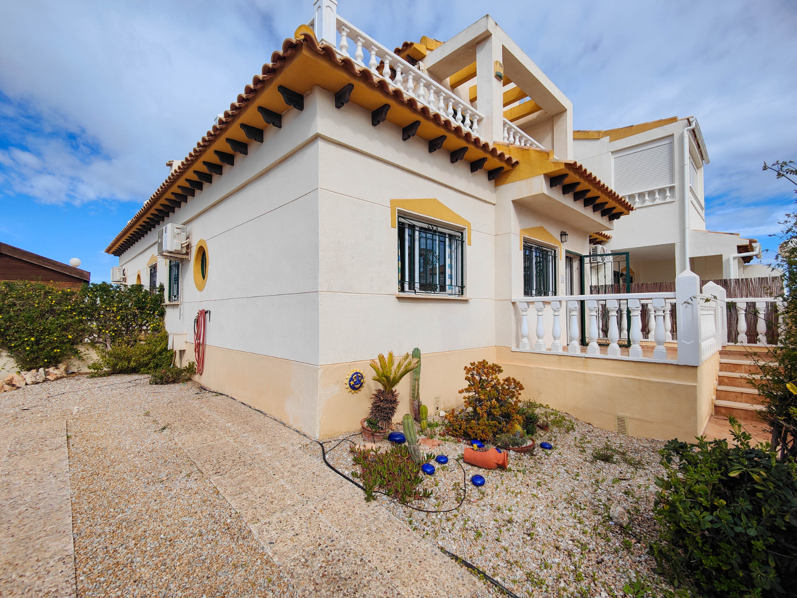 Beautiful corner quad house in Punta Prima, Orihuela Costa, located in a quiet area next to a green