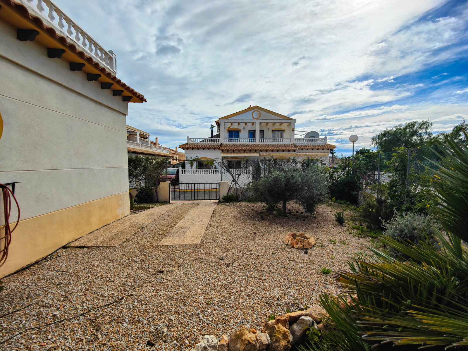 Beautiful corner quad house in Punta Prima, Orihuela Costa, located in a quiet area next to a green