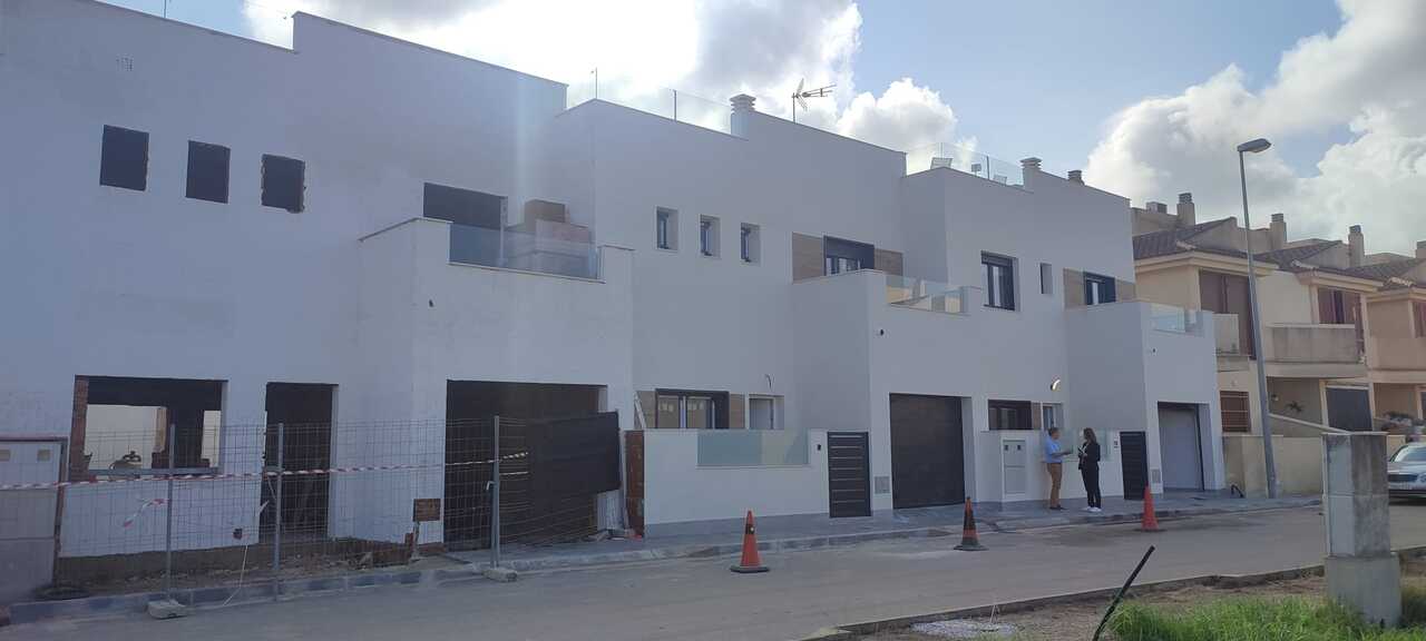 These newly constructed duplex residences each feature three bedrooms and three bathrooms across two