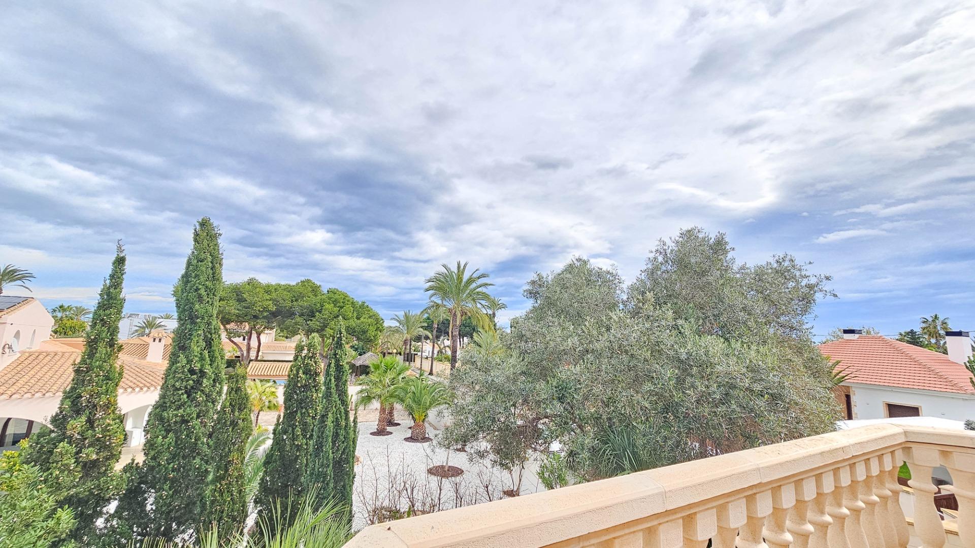 Living room in villa for sale in Cabo Roig