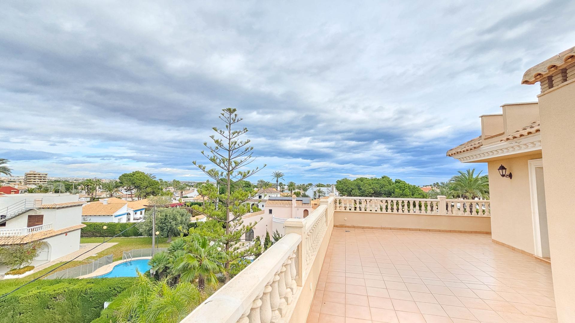 Pool area in villa for sale in Cabo Roig