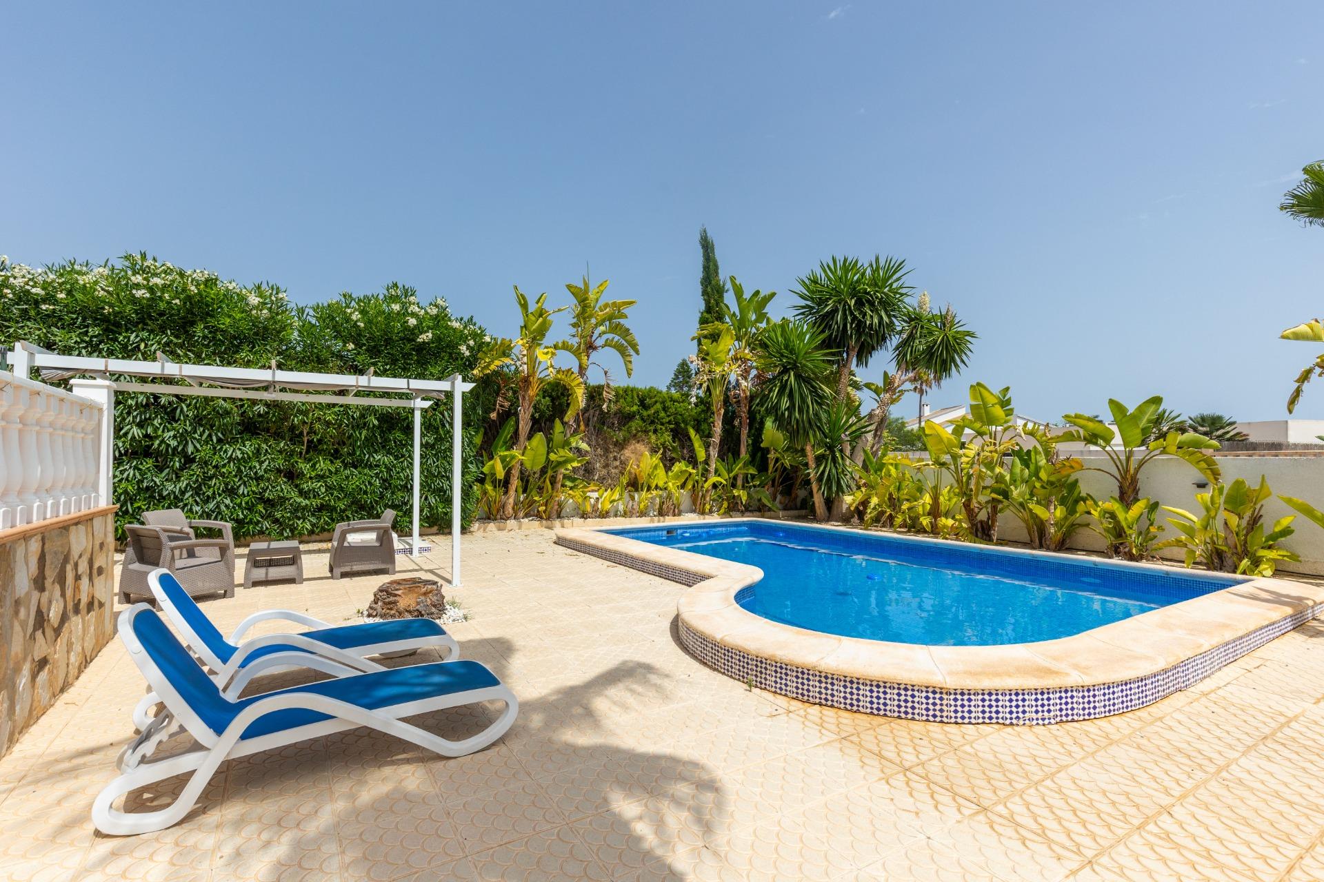 Pool area in villa for sale in San Fulgencio