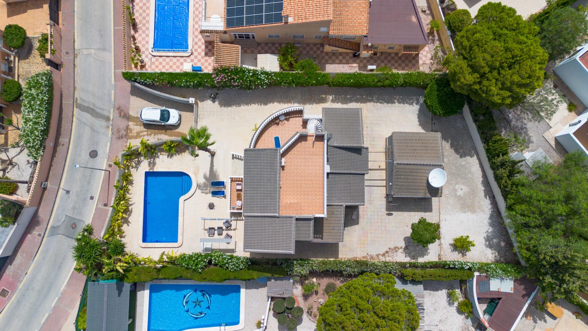 Pool area in villa for sale in San Fulgencio