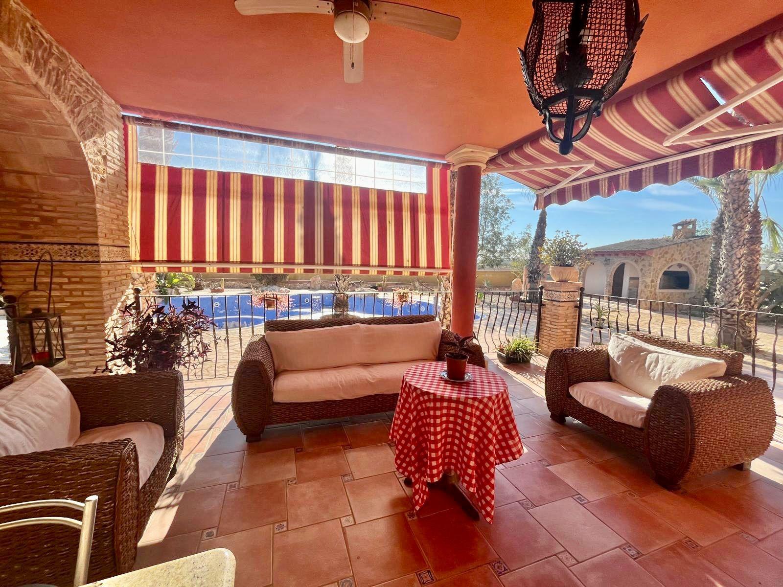 Pool area in villa for sale in Rojales