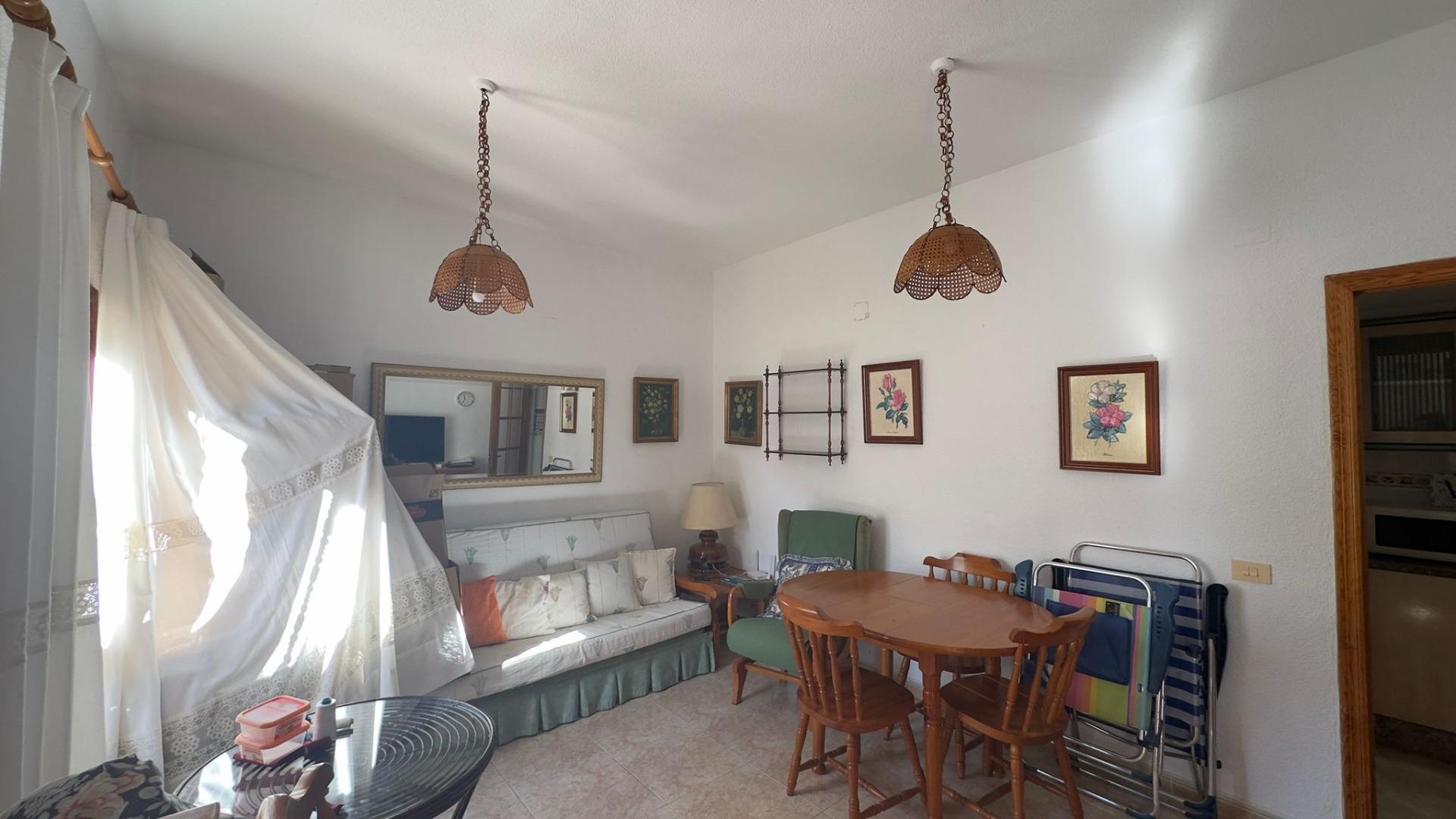 This charming two-bedroom, one-bathroom townhouse, located in the tranquil and sought-after Calas Bl