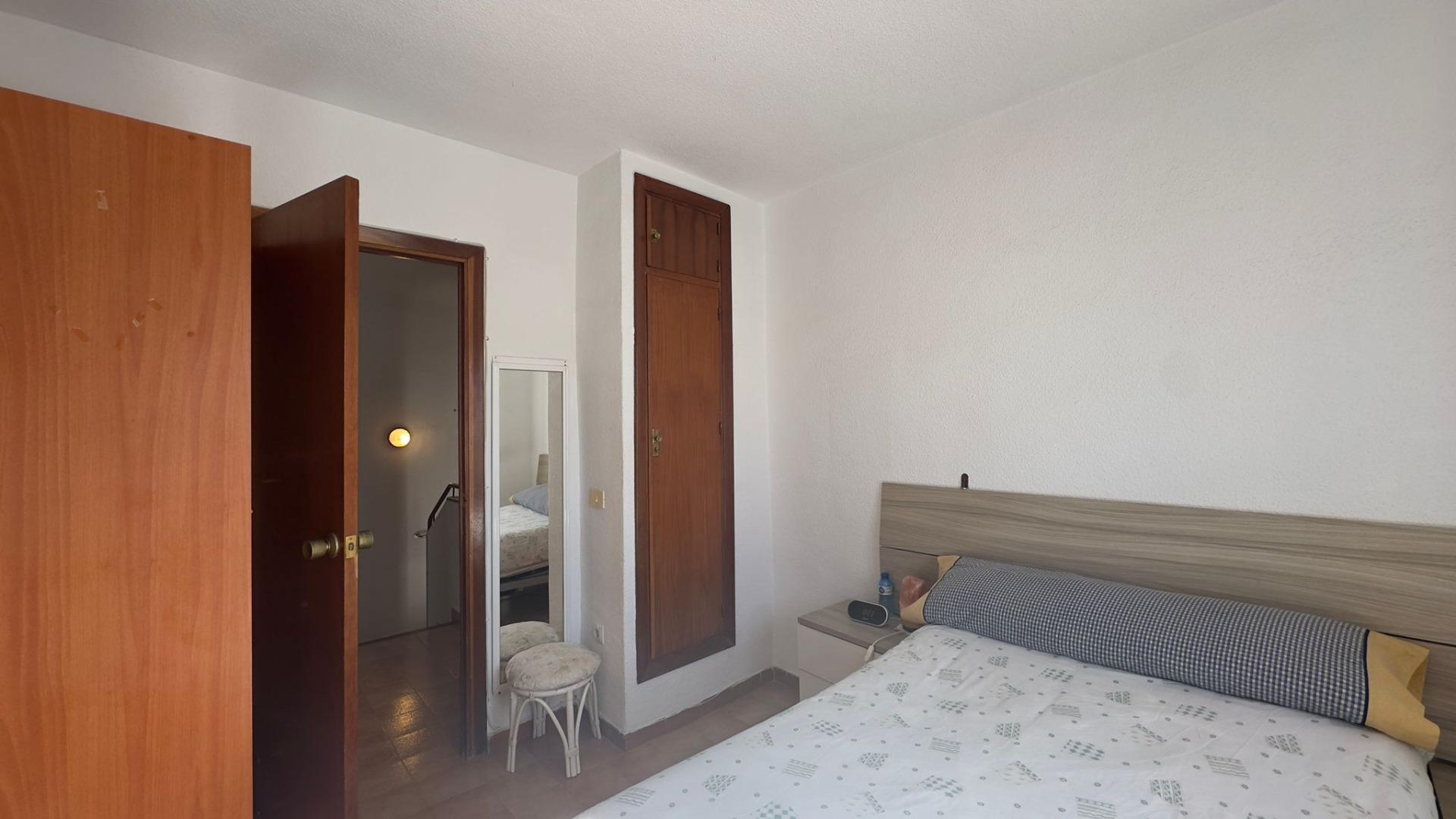 This charming two-bedroom, one-bathroom townhouse, located in the tranquil and sought-after Calas Bl