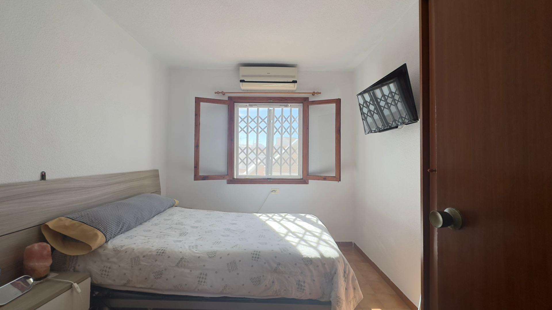 This charming two-bedroom, one-bathroom townhouse, located in the tranquil and sought-after Calas Bl