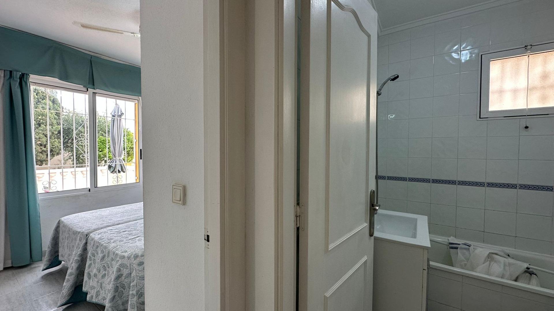 Pool area in bungalow for sale in Orihuela Costa
