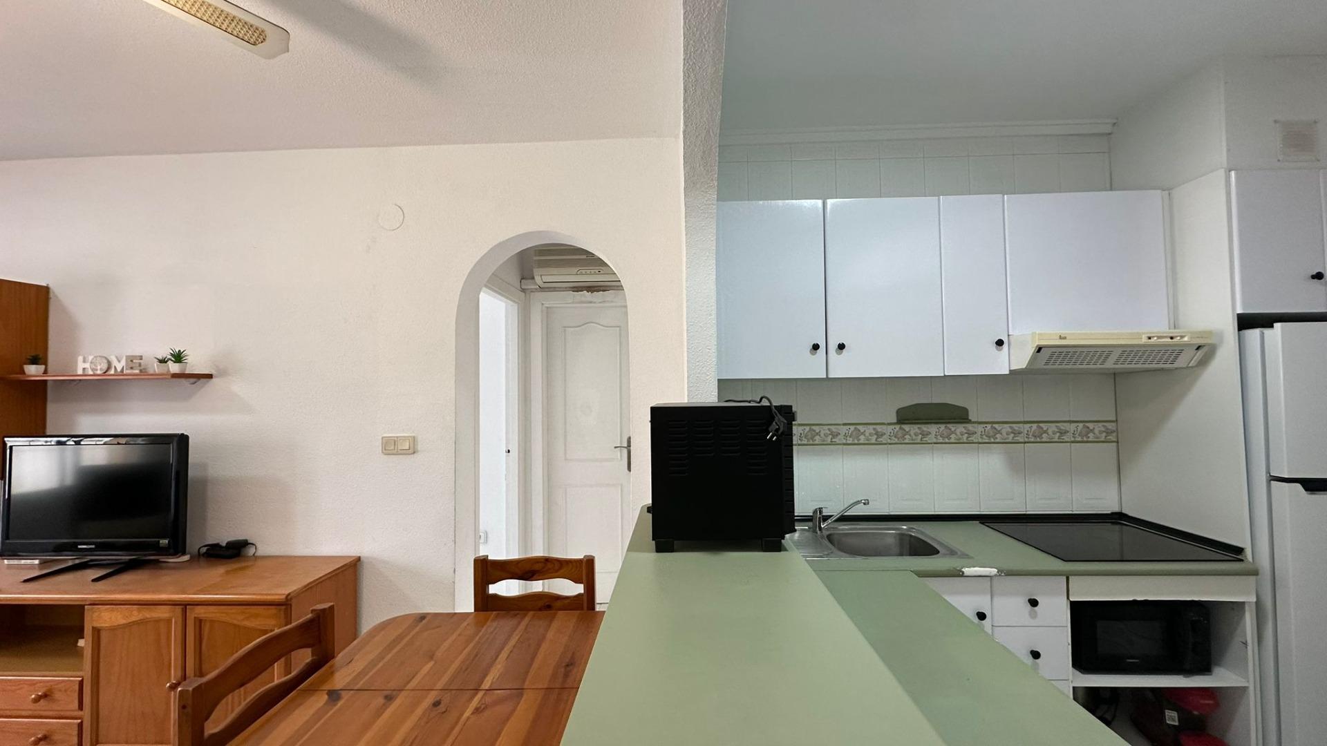 Pool area in bungalow for sale in Orihuela Costa