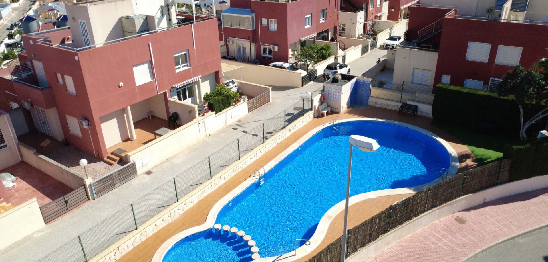 Pool area in terraced for sale in Orihuela Costa