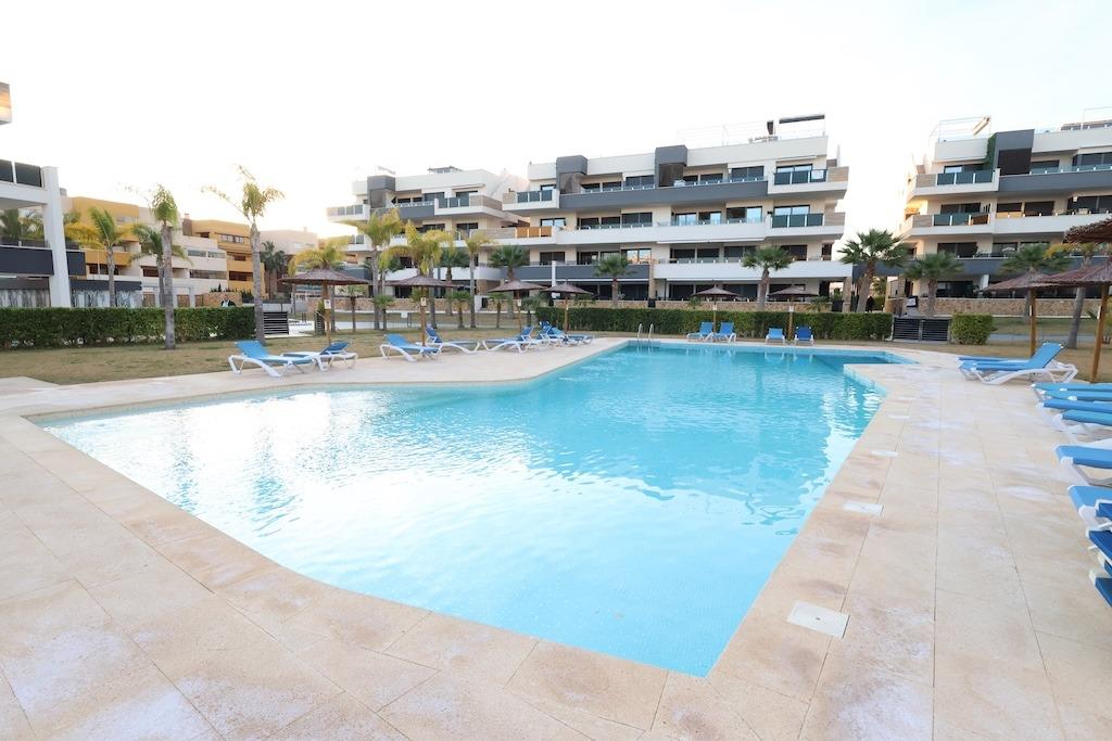 Playa Flamenca, Residencial Amanecer de Luxe: Second-floor apartment (81 m2) with sea and pool views