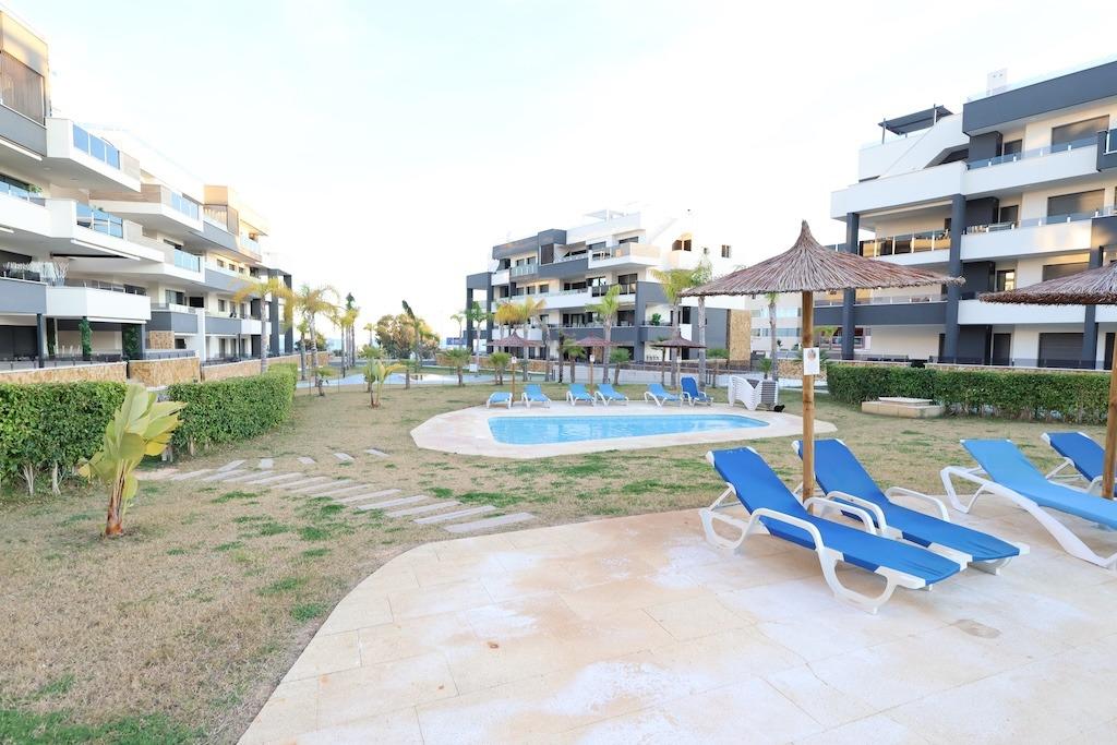 Playa Flamenca, Residencial Amanecer de Luxe: Second-floor apartment (81 m2) with sea and pool views