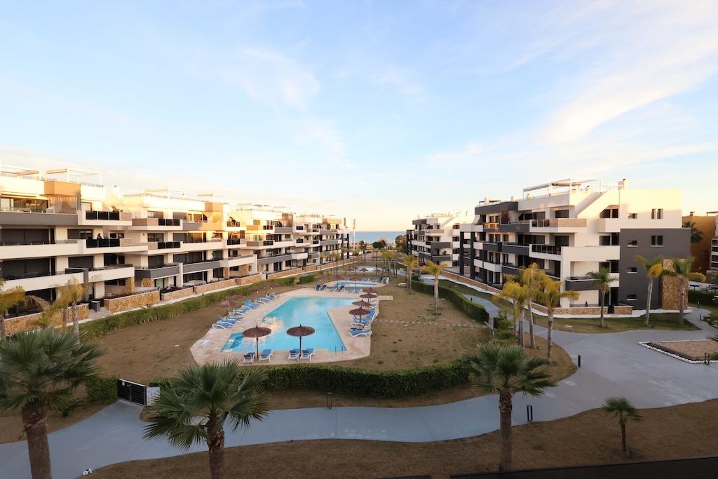 Playa Flamenca, Residencial Amanecer de Luxe: Second-floor apartment (81 m2) with sea and pool views