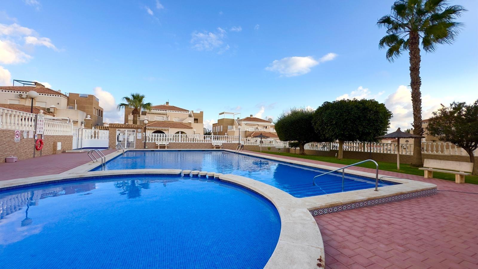 Pool area in bungalow for sale in Torrevieja