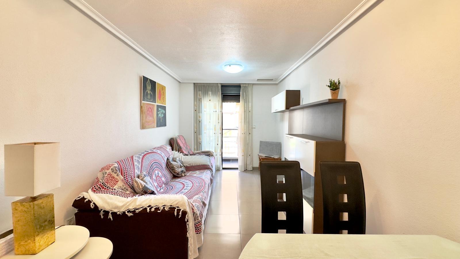 Cozy and functional 2-bedroom, 1-bathroom apartment on one of Torrevieja's most central and sought-a