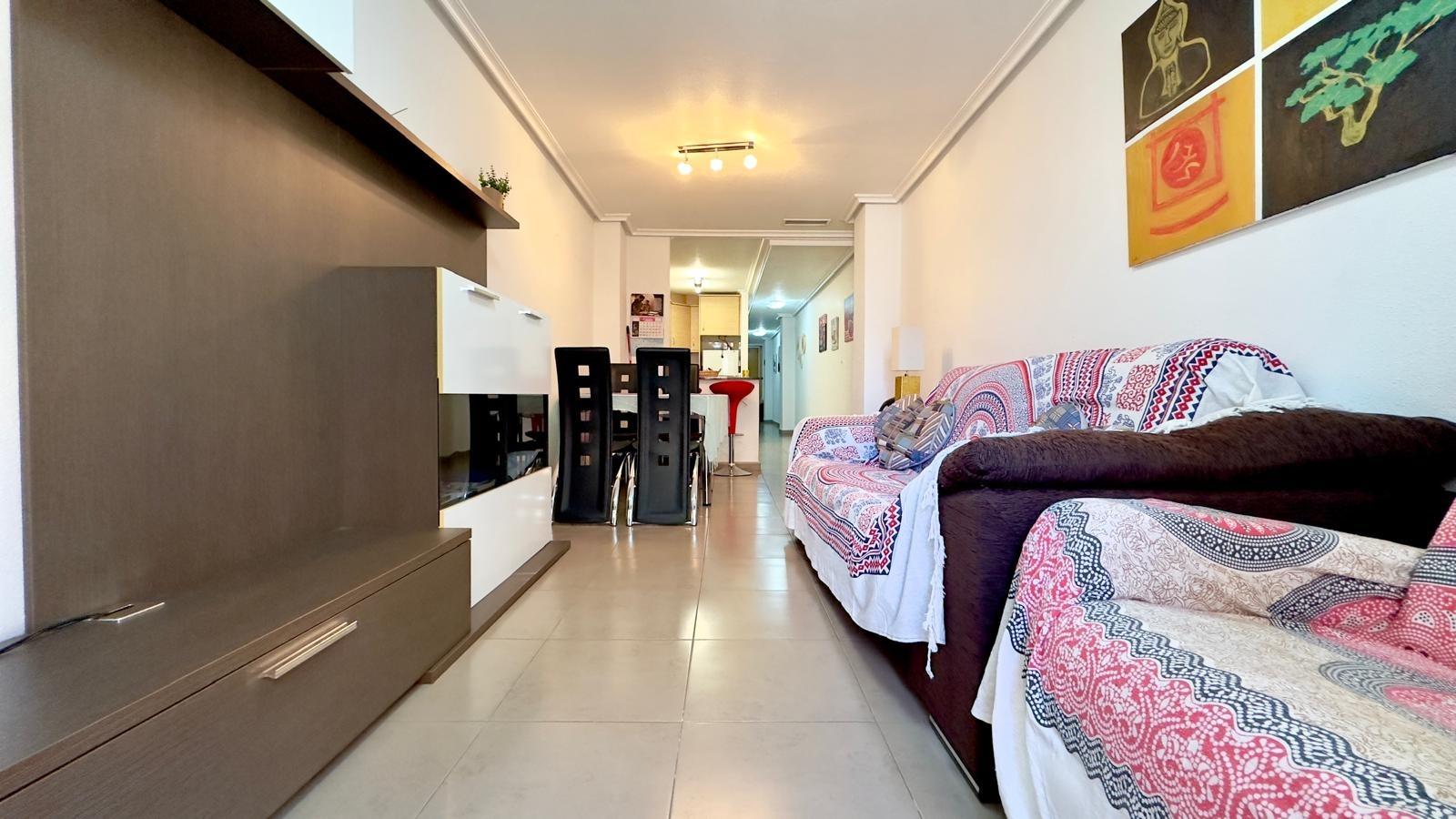 Cozy and functional 2-bedroom, 1-bathroom apartment on one of Torrevieja's most central and sought-a