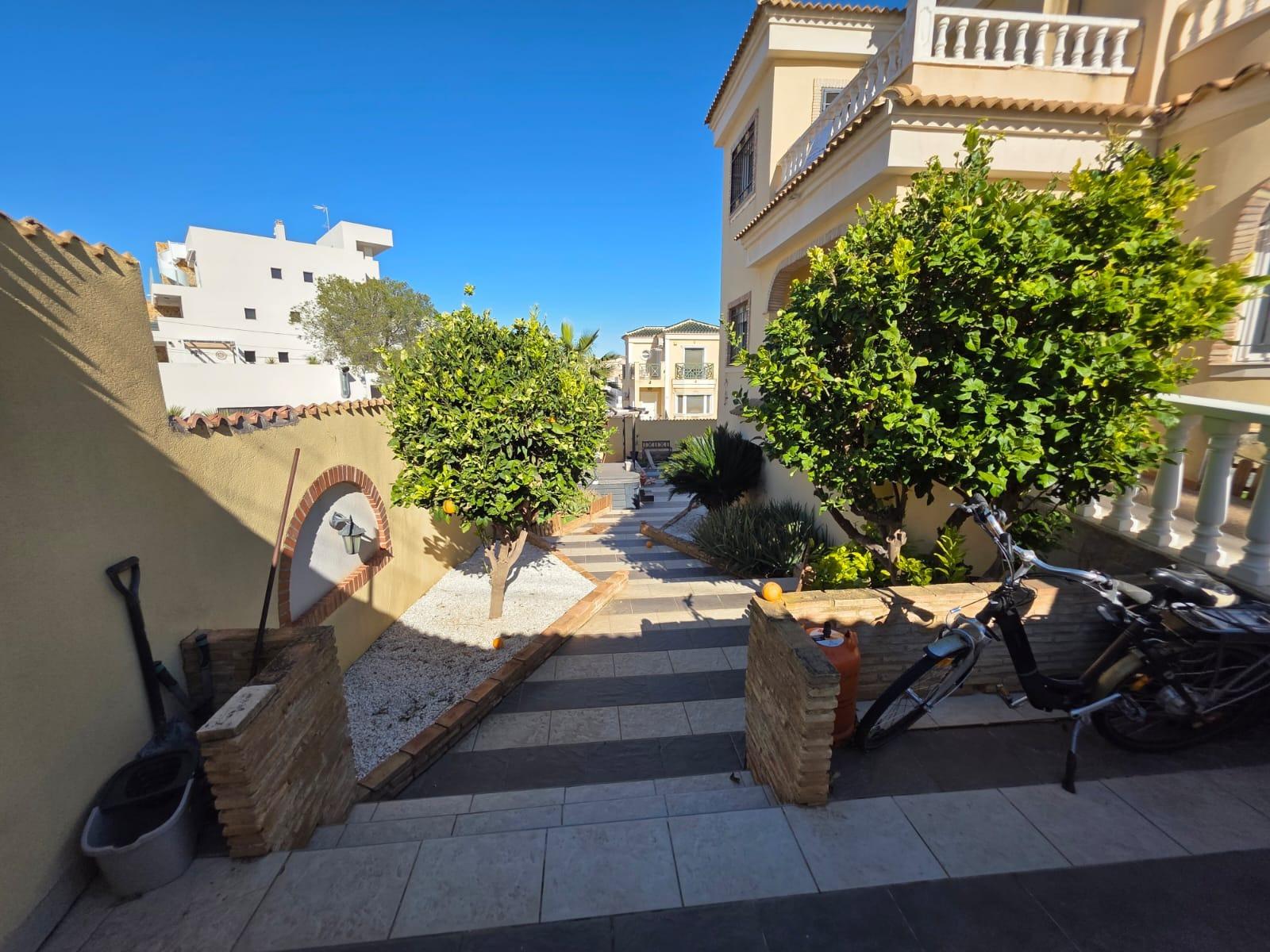 Terrace in villa for sale in Orihuela Costa