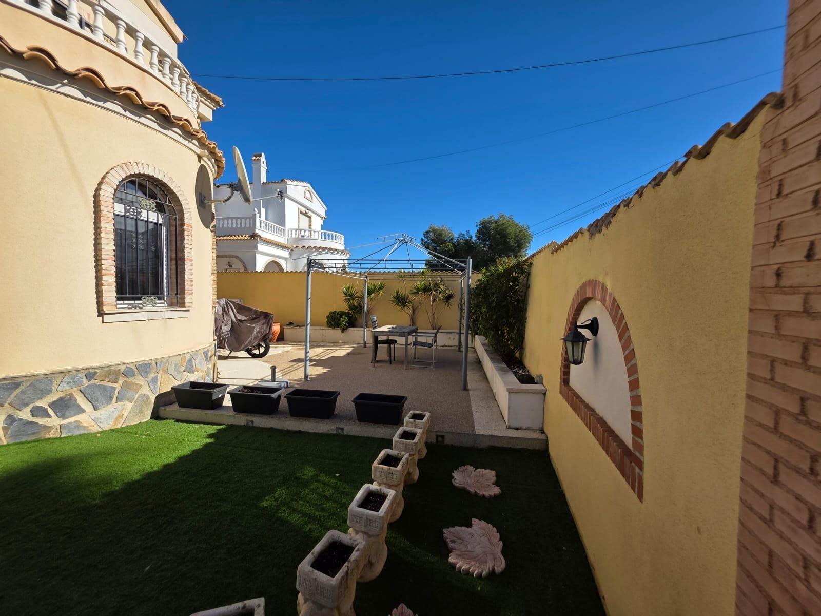 Pool area in villa for sale in Orihuela Costa