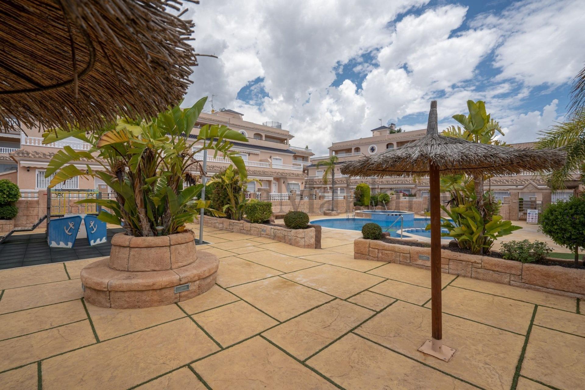 Pool area in terraced for sale in Orihuela Costa