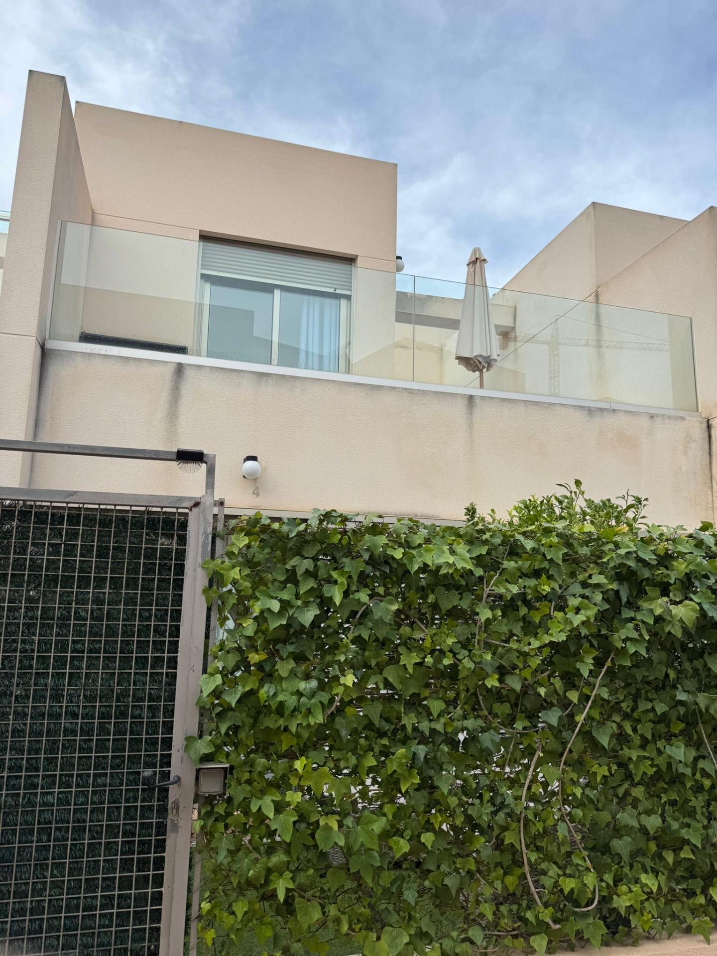 Discover this charming semi-detached villa located in the desirable Punta Prima area of Torrevieja