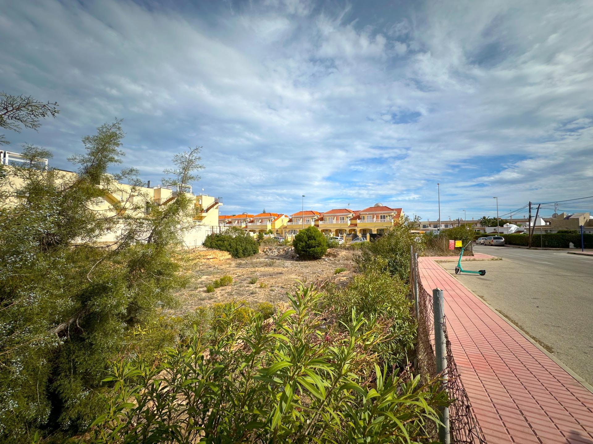 Commercial Corner Plot for Development – Investment Opportunity in Orihuela Costa (Costa Blanca) We