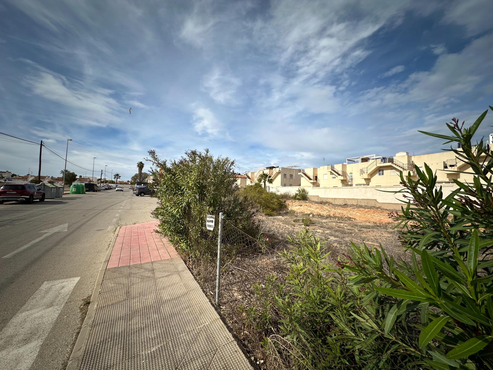 Commercial Corner Plot for Development – Investment Opportunity in Orihuela Costa (Costa Blanca) We