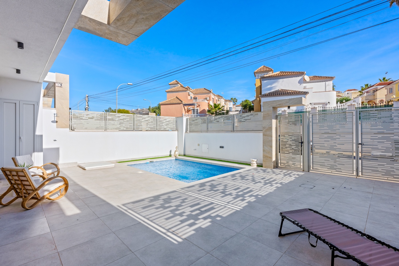 Pool area in villa for sale in Orihuela Costa