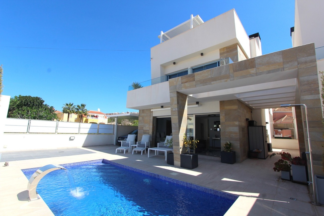Completed in 2022, this fabulous 3 bed (potentially 5), 4 bath contemporary style new-build villa is