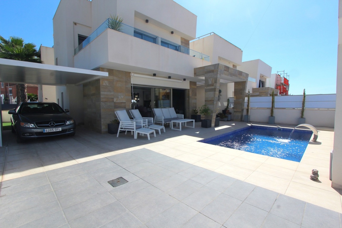 Completed in 2022, this fabulous 3 bed (potentially 5), 4 bath contemporary style new-build villa is
