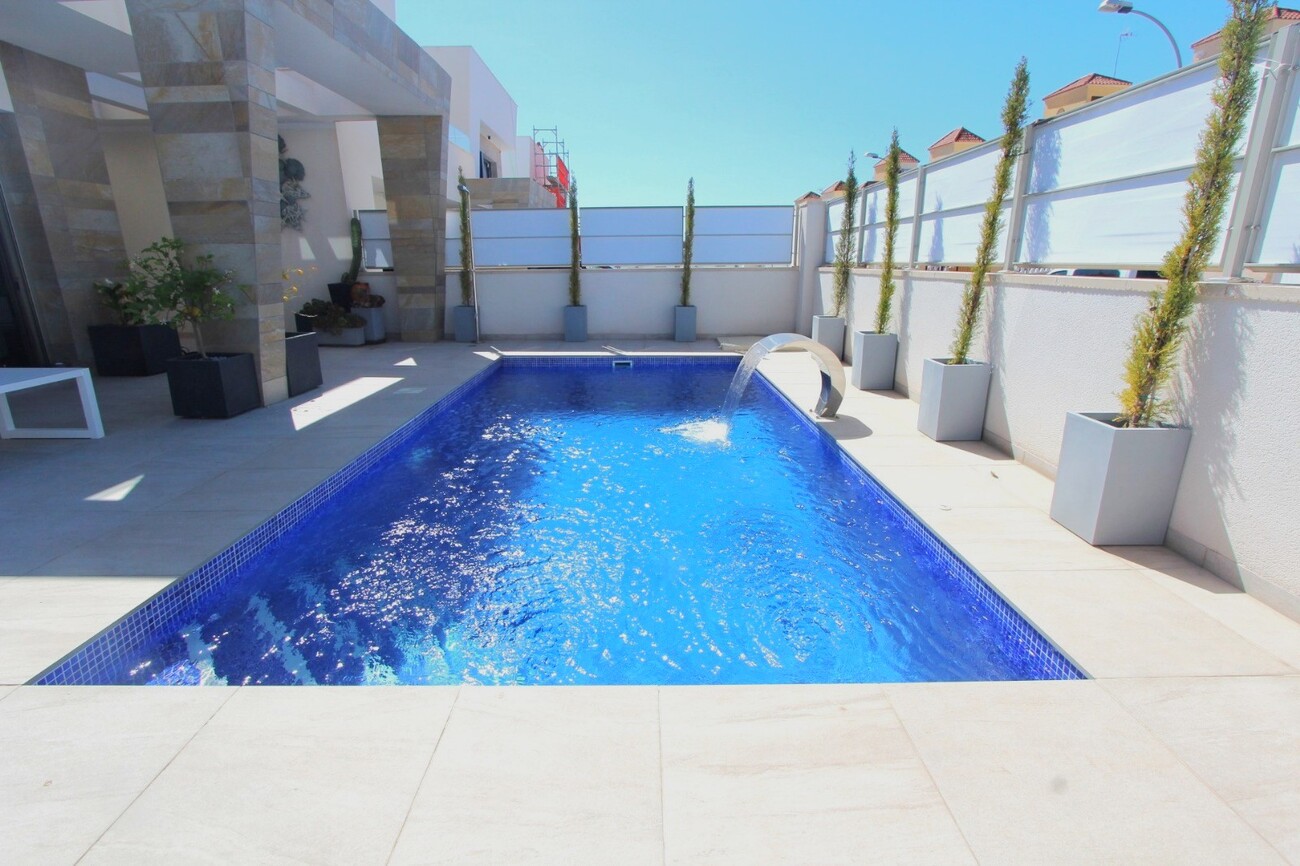 Completed in 2022, this fabulous 3 bed (potentially 5), 4 bath contemporary style new-build villa is
