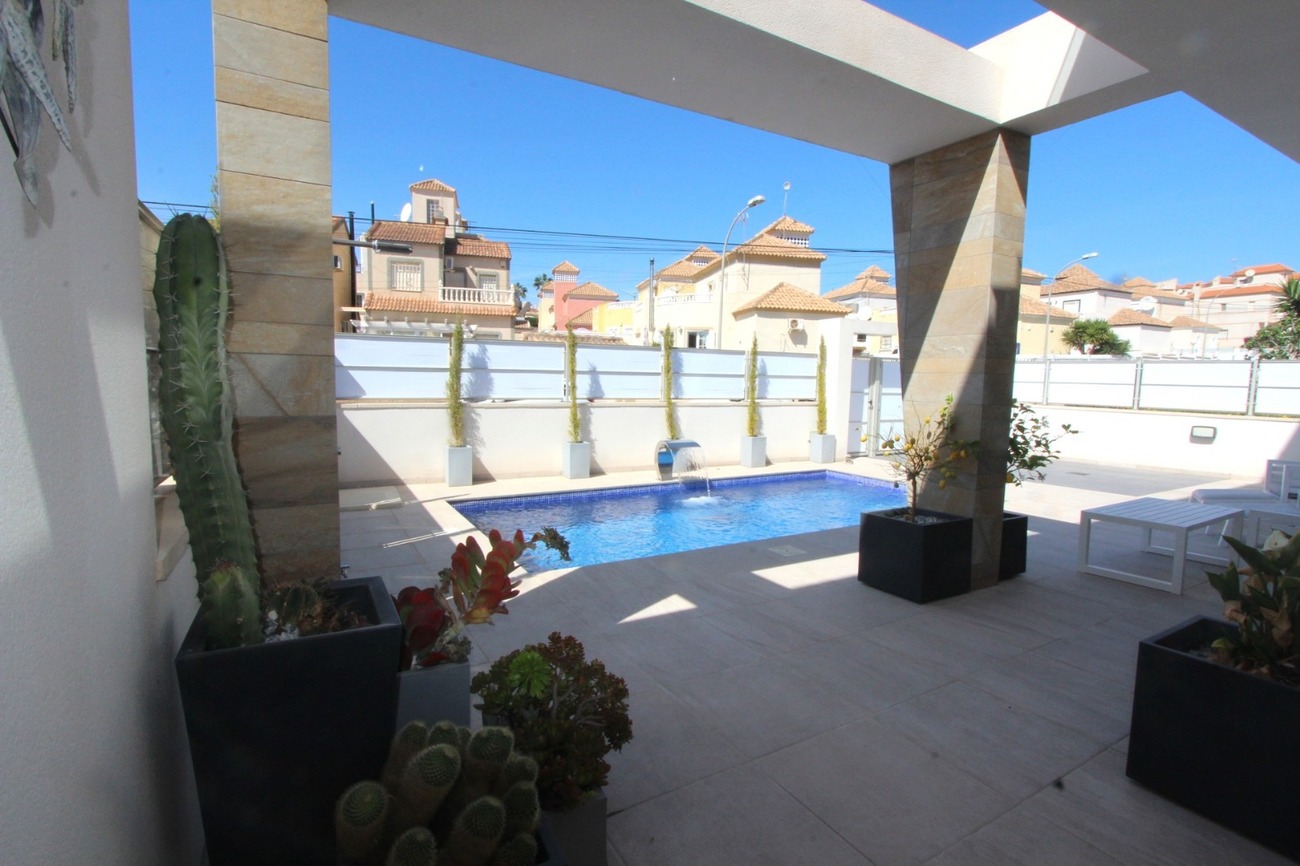 Completed in 2022, this fabulous 3 bed (potentially 5), 4 bath contemporary style new-build villa is