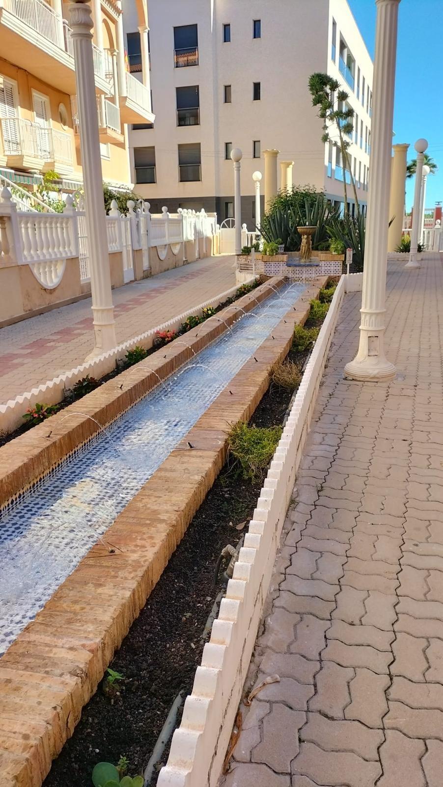 Pool area in apartment for sale in Torrevieja