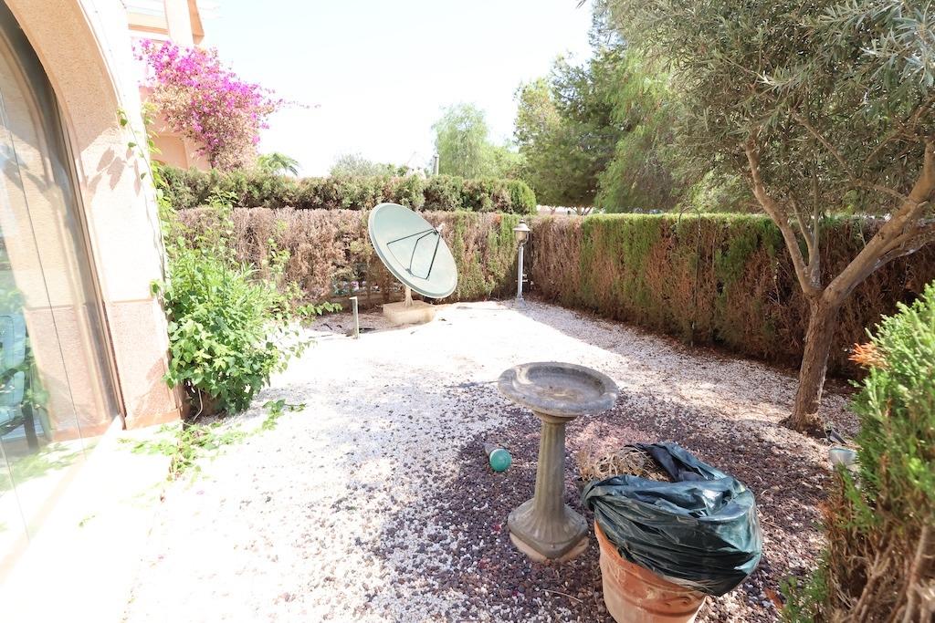 Pool area in bungalow for sale in Orihuela Costa