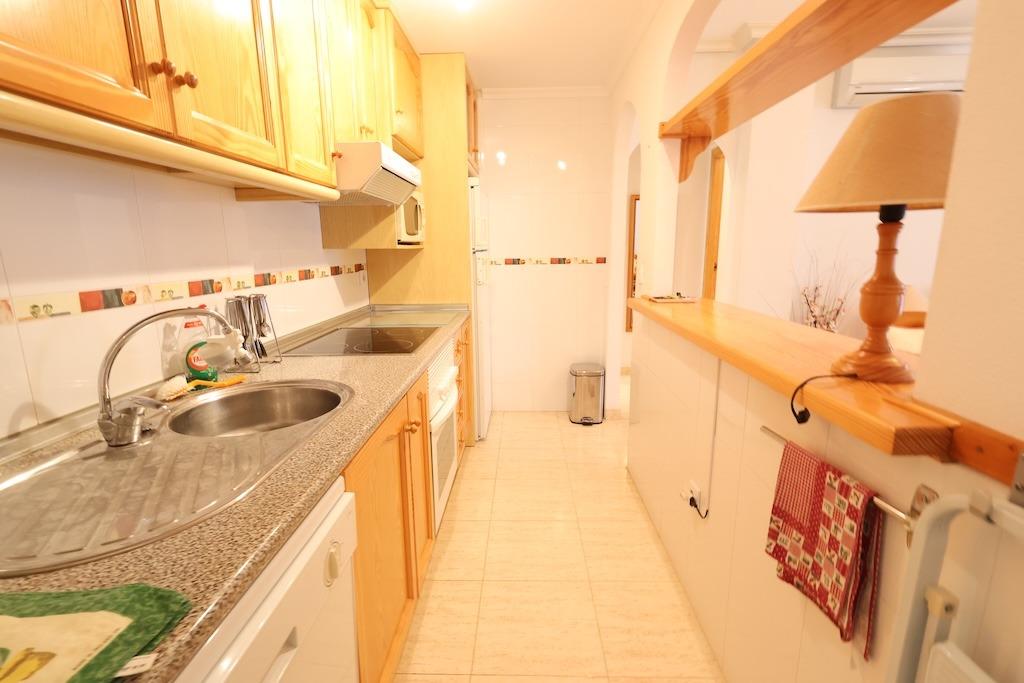 Pool area in bungalow for sale in Orihuela Costa