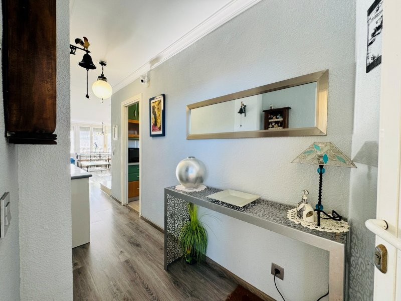 Living room in penthouse for sale in La Mata